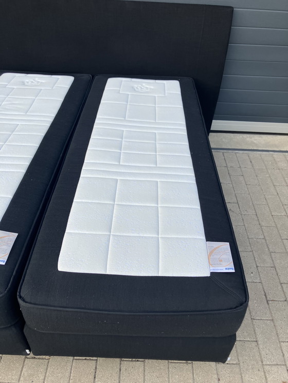 Image 1 of Auping Boxspring 160x200 nero con materassi Auping Cresto in ottime condizioni!