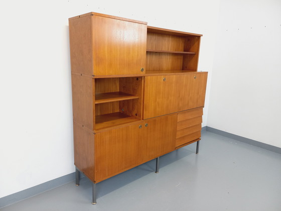 Image 1 of Louis Paolozzi's vintage modernist secretary bookcase for Monopoly in teak and metal from the 60s