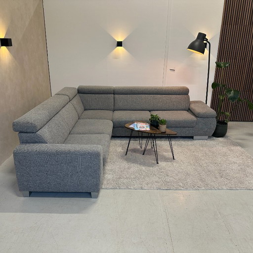 Sofá esquinero gris jaspeado 273x255 cm