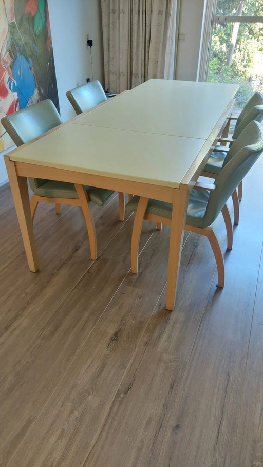 Leolux Dining area with 4 leather chairs