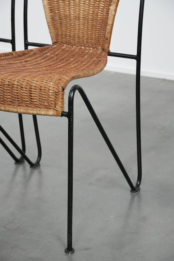 Image 1 of 2x Vintage design eetkamerstoelen van Frederick Weinberg met een gietijzeren frame