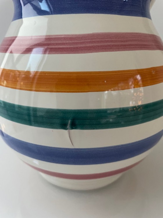 Image 1 of Handgemaakte vintage schenkkan met kleurrijke strepen