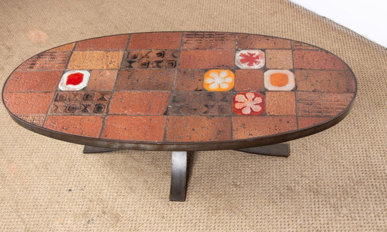 Image 1 of Tavolino da caffè in pietra lavica, ceramica e acciaio, disegnato da Jean Jaffeux nel 1960.