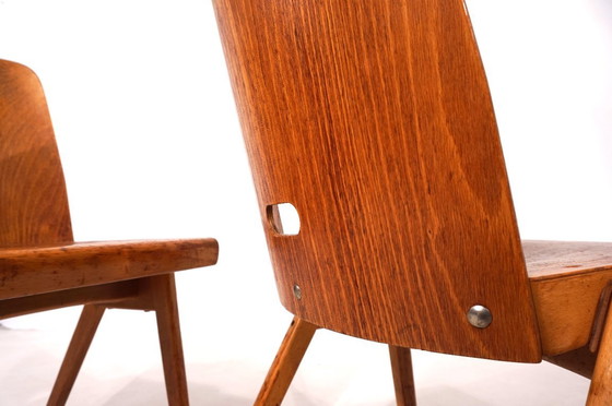 Image 1 of Set di due sedie da pranzo impilabili in compensato, 1960