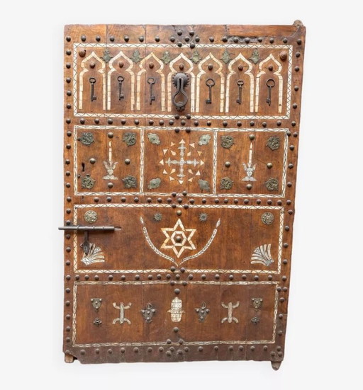 Berber heritage: antique door decorated with camel bones