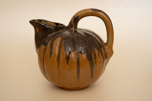 Pumpkin shaped decanter made of pottery