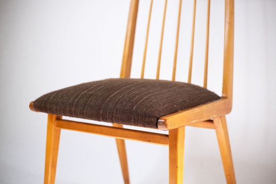 Image 1 of Slim wooden chair with brown upholstery