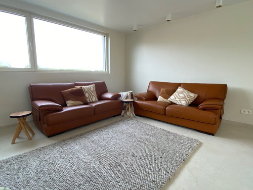 2x Leather sofa 2.5 seats Rivet-Lozano