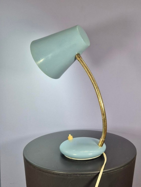 Image 1 of Massive desk lamp in light blue pastel.