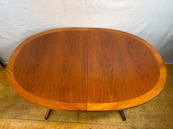 Image 1 of Mid-Century Retro Vintage Teak Extending Dining Table by Nathan 1960s  Seats Up to Six • Stylish & Practical • British Design Cl