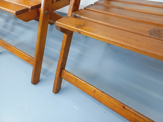 Image 1 of Vintage garden furniture consisting of a table with extensions and 4 wooden armchairs from the 60s