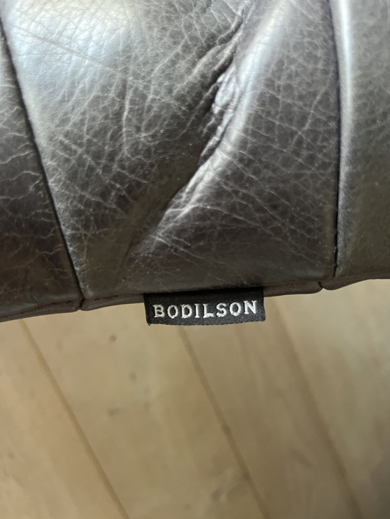 Image 1 of Mooie zwarte leren draaifauteuil van het merk Bodilson.