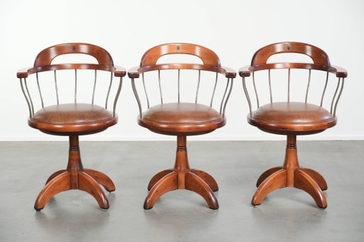 3 x Draaibare Schuitema stoel/ bijzetstoel/ bureaustoel met een cognac kleurige rundleren zitting