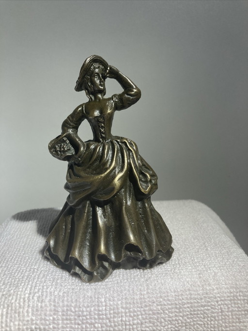 Campanello di servizio in bronzo d'epoca raffigurante una donna aristocratica