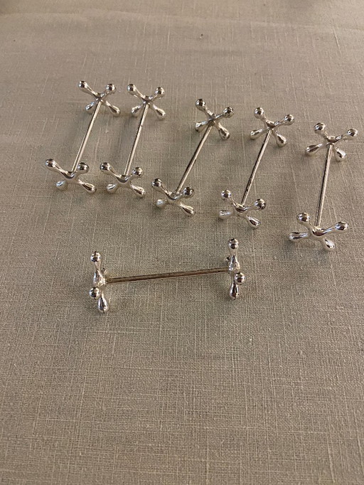 FOR SALE: 6 silver-plated knife rests / accessories