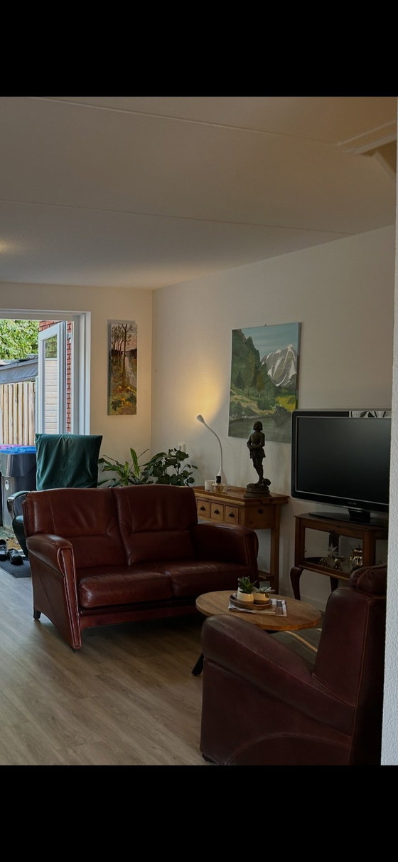 Image 1 of English-style leather seating area