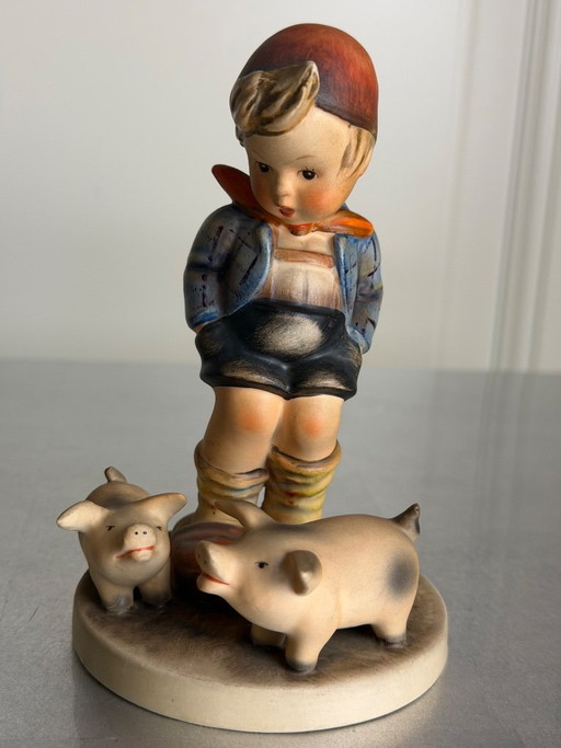 Original Goebel Hummel figurine "Farm Boy" (Hum 66) – boy with two pigs – Western Germany – circa 1950s/1960s