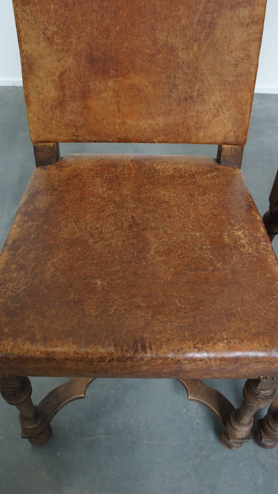 Image 1 of Satz von 2 antiken Esszimmerstühlen aus Holz und Schafsleder aus den frühen 1900er Jahren