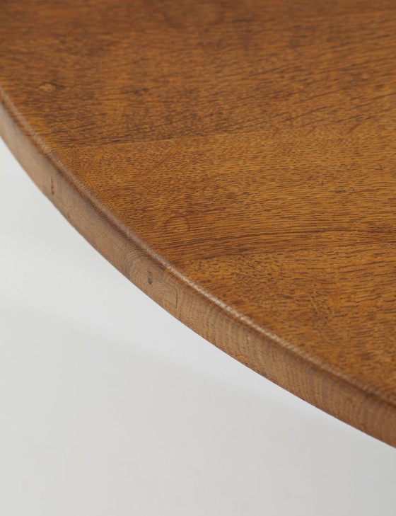 Image 1 of Vintage Brutalist round tripod coffee table in solid oak, circa 1960