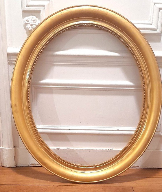 Image 1 of Cornice ovale dorata