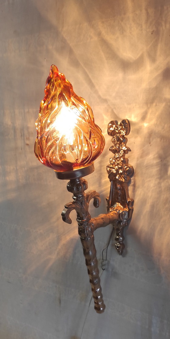 Image 1 of Torch-style wall sconces in gilded cast aluminum and glass - mid-20th century