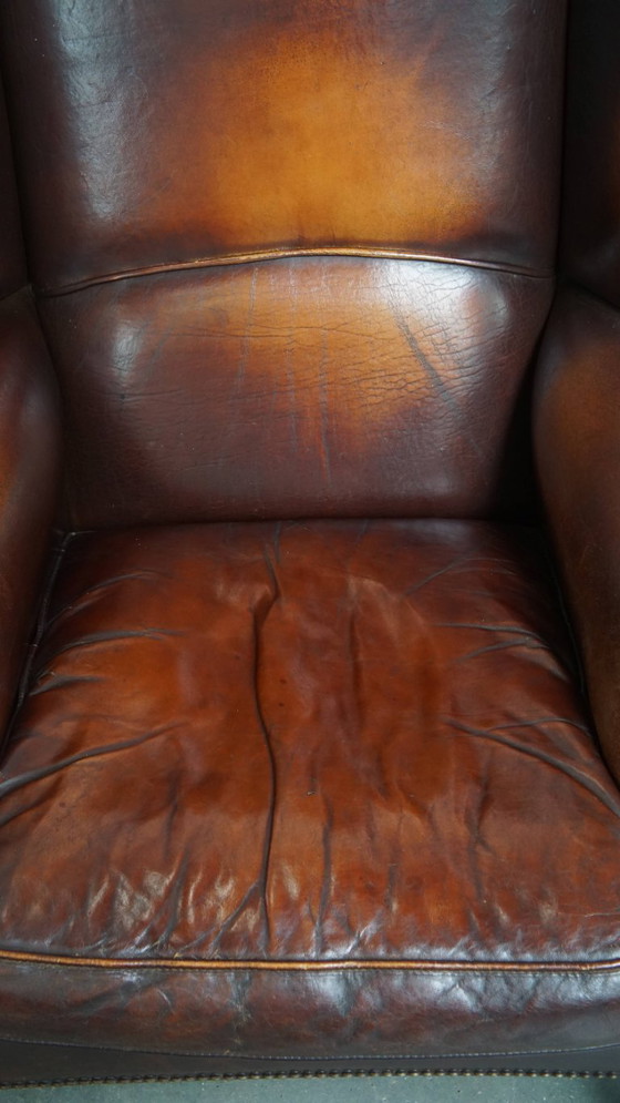 Image 1 of Donkere Engelse stijl schapenleren oorfauteuil