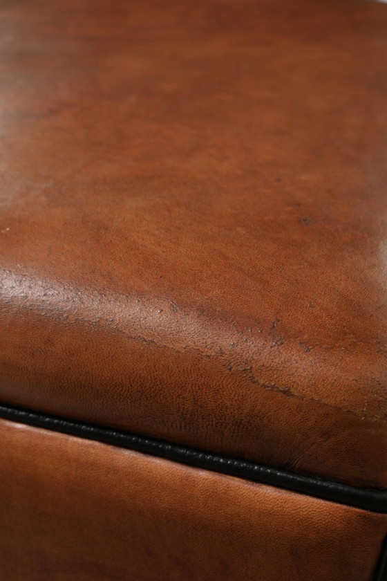 Versatile sheepskin leather footstool/pouf in a warm cognac color – Footstools & poufs, Klassiek (photo 7 of 10)