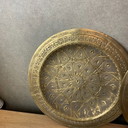 Collection of vintage brass plates vases and trinkets