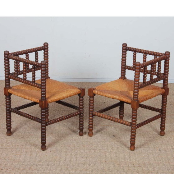 Image 1 of Pair of small turned wood corner chairs with straw seats, 1940