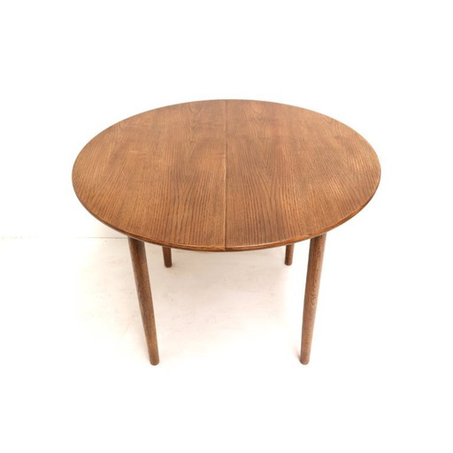 Vintage extendable round dining table from the 1970s