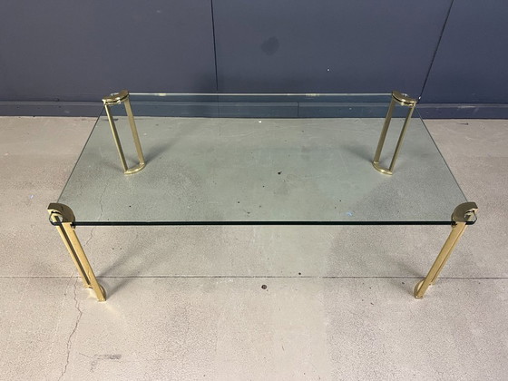 Image 1 of Salontafel in Peter Ghyczy-stijl, gemaakt van messing en glas.