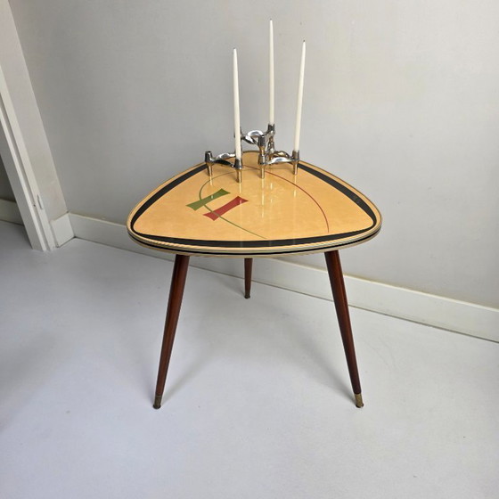 Image 1 of Vintage coffee table. Triangular, three-legged "kidney table". Top with funky retro pattern. 1950 / 1960. Mid-century
