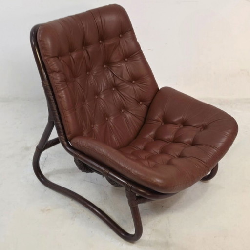 Fauteuil danois en rotin et cuir, années 70, état neuf, milieu du siècle