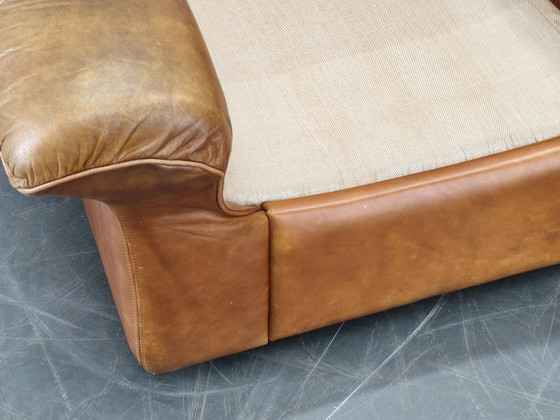 Image 1 of Een paar Arcon Italia loungefauteuils van cognacbruin buffelleer.