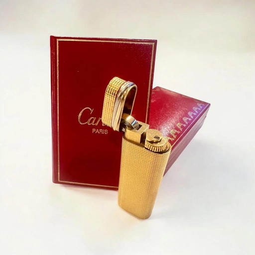 Original Vintage Cartier Gold-Plated Lighter with Trinity Band from 1983, with Certificate, Original Box, and Travel Case.