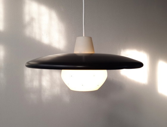 Image 1 of Vintage milk glass UFO-shaped pendant lamp with metal saucer, mcm lamp