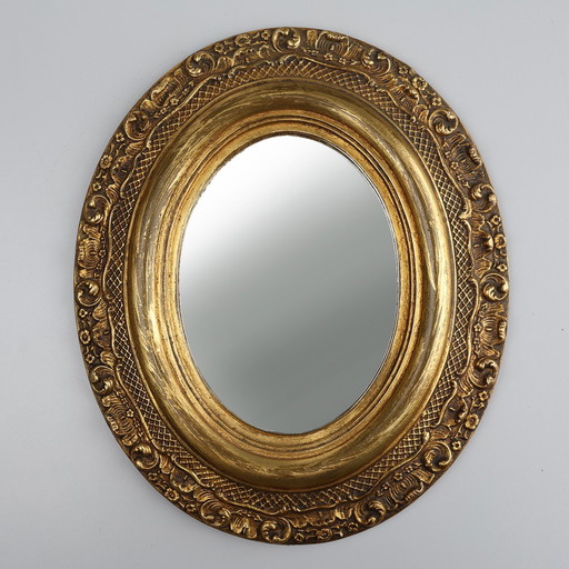 French Baroque Style Oval Mirror in Gilded Wood with Floral Decorations