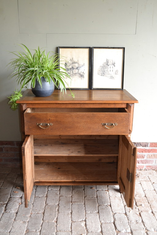 Antique oak wooden sideboard.