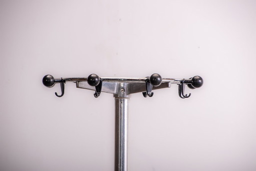 Coat rack in metal and bakalite