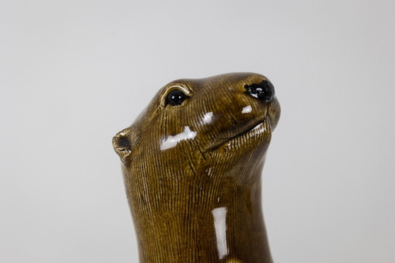 Image 1 of Valérie Courtet. Loutre Tenant un Poisson. Contemporain.