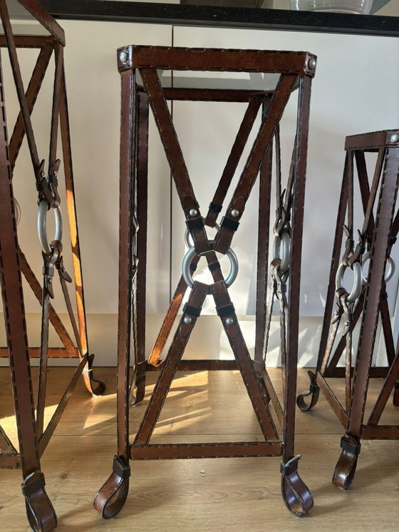 Image 1 of Unique set of 3 console tables – France, 1970s – in the style of Jacques Adnet – iron (imitation leather) and glass