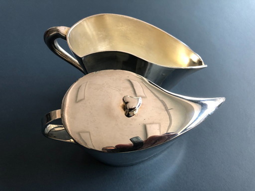 Silver plated sugar and milk jug with matching spoon