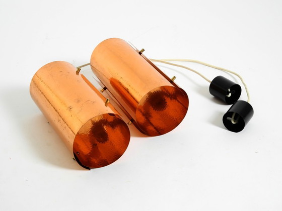 Image 1 of Two rare mid-century tube pendant lamps consisting of two screwed-together copper bowls