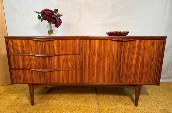 Image 1 of Mid Century Retro Teak Sideboard by Elliotts of Newbury Circa 1960  A stunning mid century modern sideboard