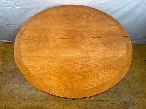 Image 1 of Mid-Century Retro Vintage Teak Extending Round Dining Table by Parker Knoll – 1970.    Elegant|Space-Saving|Practical|Iconic Bri