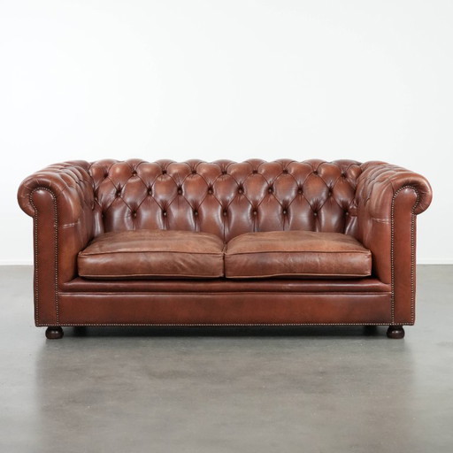 Sofá Chesterfield clásico de piel de vaca marrón de estilo inglés
