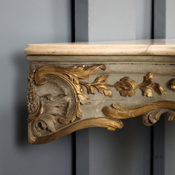 Image 1 of Console table in carved, gilded and lacquered wood