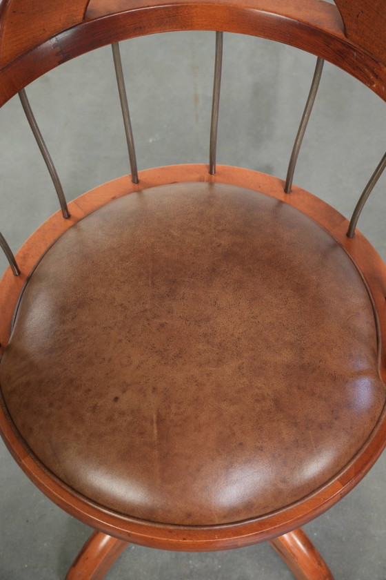 Image 1 of 3 x Draaibare Schuitema stoel/ bijzetstoel/ bureaustoel met een cognac kleurige rundleren zitting