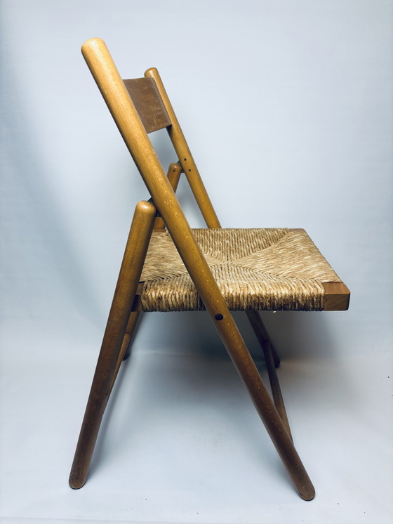 Image 1 of Set of 2 vintage wooden folding chairs with rattan seats – 1970s/1980s kg