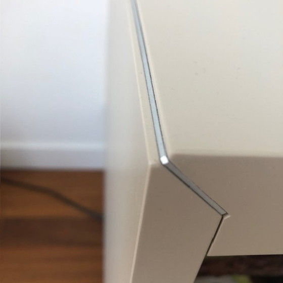 Image 1 of Armadio a ribalta di design con due mensole a muro adiacenti .